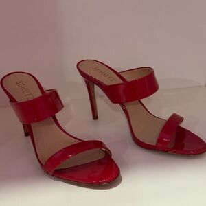 Brand new. Never worn. Schutz Red Patent Leather Mules.
